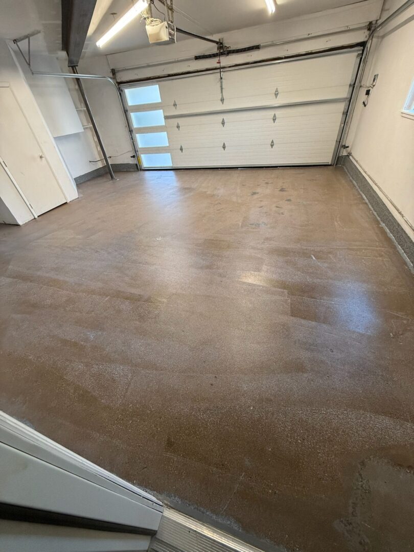 Clean, polished garage floor with a smooth finish.