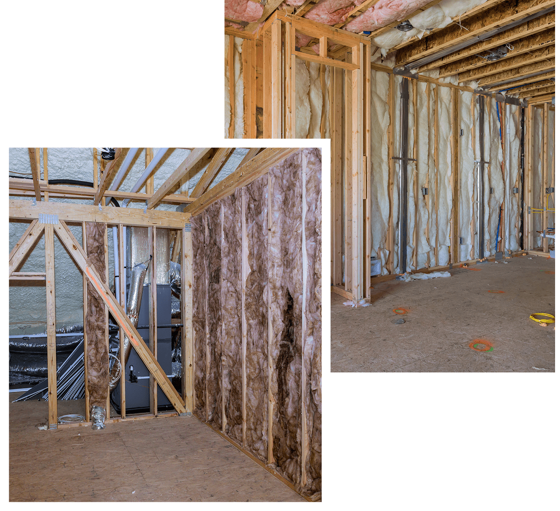 Interior walls of a house under construction with wooden framing and insulation.
